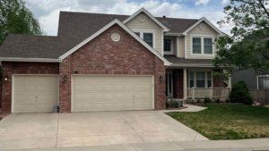 Photo of exterior painting of a Littleton home with Sherwin Williams Kilim Beige