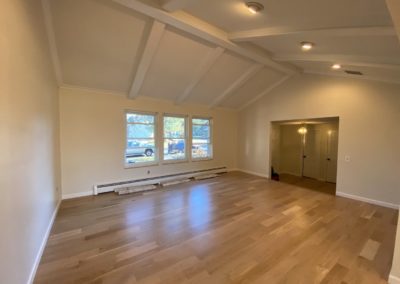 Large open room painted walls, trim, and ceilings