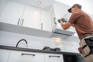 Image of taking apart cabinet hardware