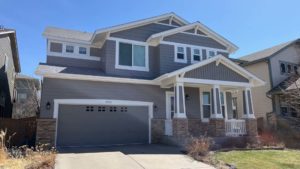 Photo of an exterior home painted in Sherwin Williams Dovetail
